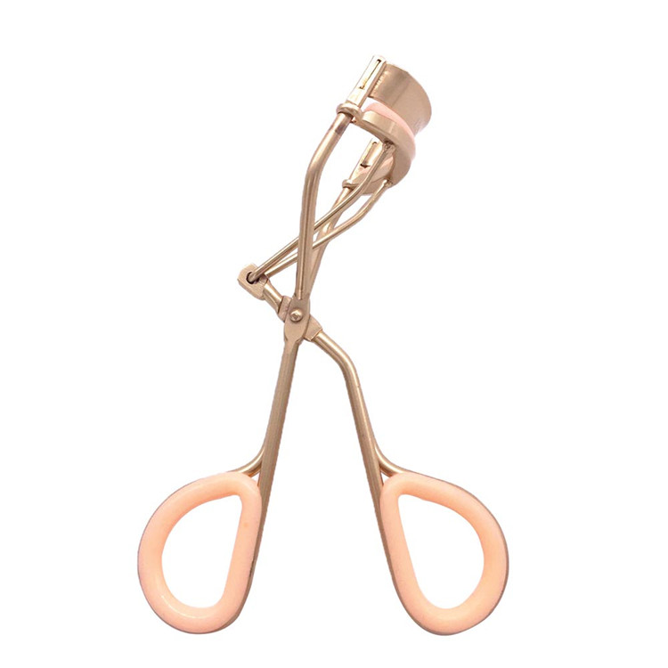 yellow eyelash curler.jpg